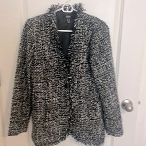 Black silver white overcoat looks great with jeans, dress pants and black dress